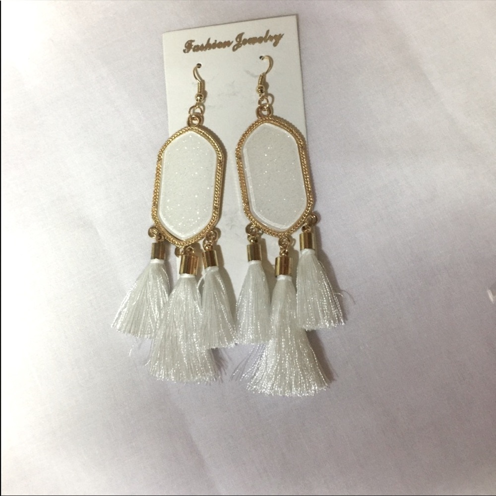 White and gold 5 in long earring brand new
